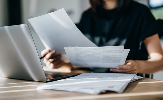 woman with paperwork